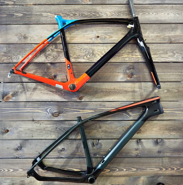 Bicycle frames on wooden wall