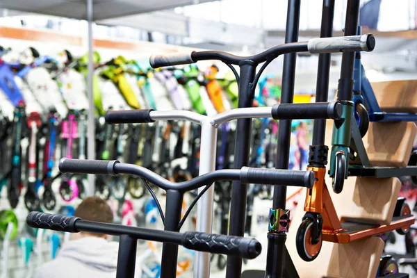 Handlebars of scooters in store — Stock Photo, Image