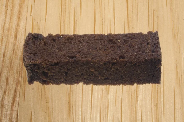 Pâine pe fundal din lemn — Fotografie, imagine de stoc