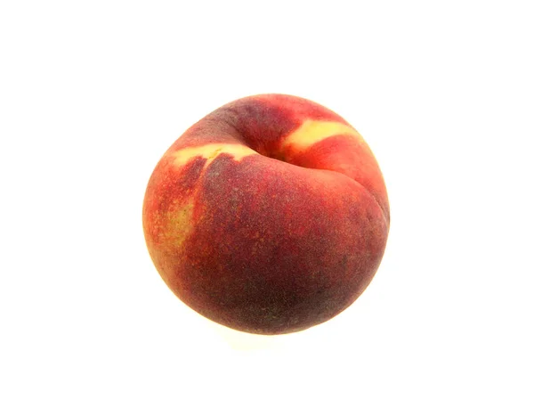 Персик ізольований на чорному фоні — стокове фото