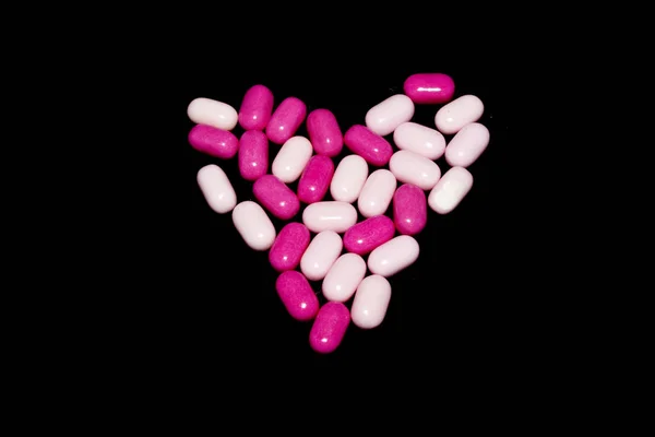 Medical pills isolated on black background — Stock Photo, Image