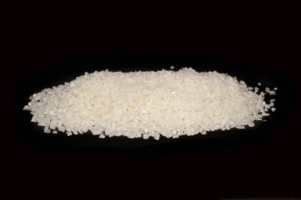 Salt isolated on black background — Stock Photo, Image