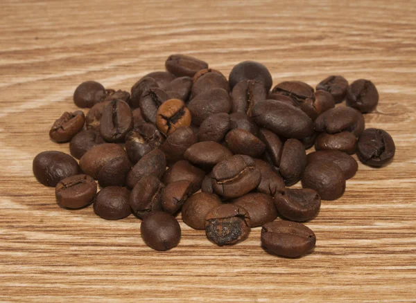 Kaffe på trä bakgrund — Stockfoto
