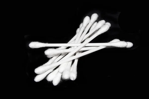 Ear sticks isolated on black background — Stock Photo, Image