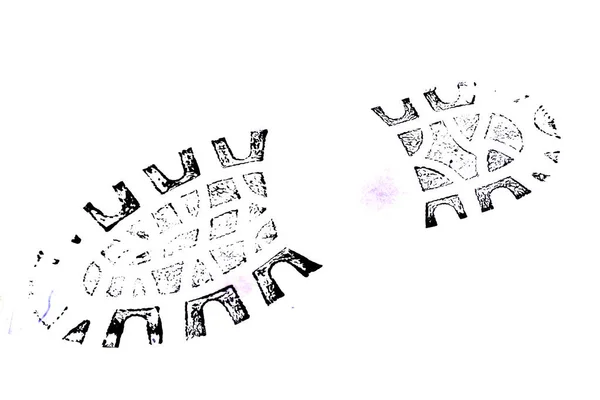 Beyaz arkaplanda izole edilmiş ayakkabı izi