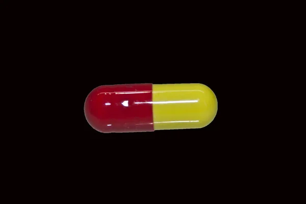 Comprimido médico isolado sobre fundo branco — Fotografia de Stock