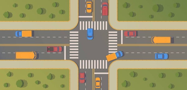Crossroads of two roads with pedestrian paths, curbs and boards, road markings, grass, bushes and trees.