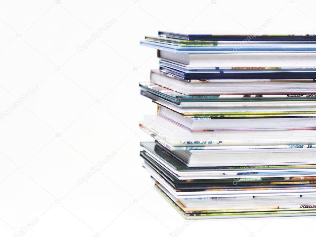 collection of books with colorful covers isolated on white background, close-up   