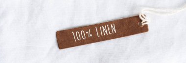 100% keten etiketi ile organik beyaz keten dokusu