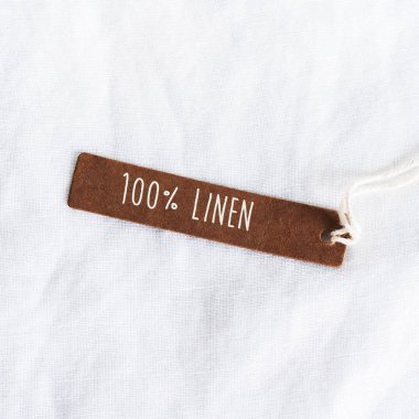 100% keten etiketi ile organik beyaz keten dokusu