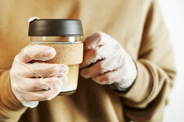 Female Hands Disposable Gloves Holding Reusable Travel Glass Mug Takeaway — Stock Photo, Image