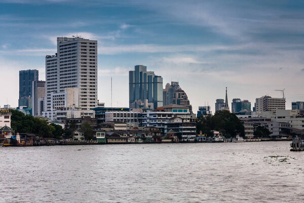 High-rise buildings in the downtown Bangkok on the Chao Phraya River, Thailand