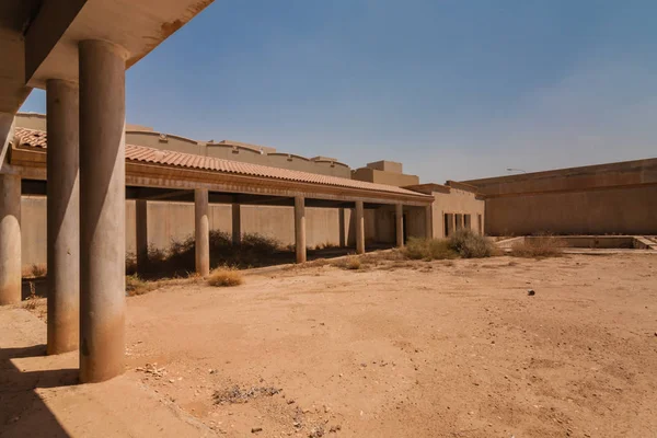 A backyard with a pool of the abandoned luxury villa in Riyadh