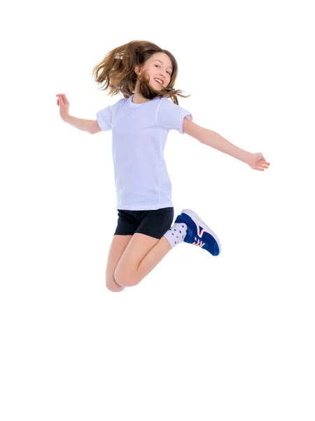 A teenage girl is jumping — Stock Photo, Image