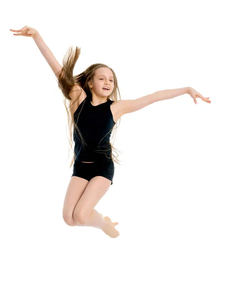 Menina ginasta salto . — Fotografia de Stock