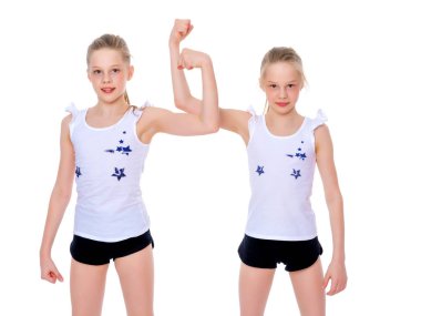 Kızlar jimnastikçiler kendi kaslarını göster.