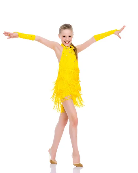 A cheerful little girl is dancing. — Stock Photo, Image