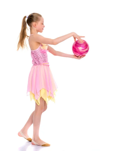 Girl gymnast performs exercises with the ball. — Stock Photo, Image