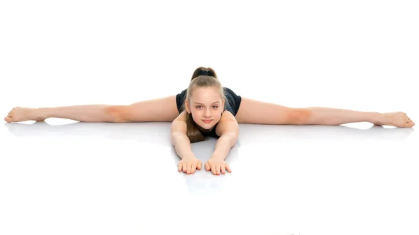Chica gimnasta realizar el ejercicio de cuerda . —  Fotos de Stock