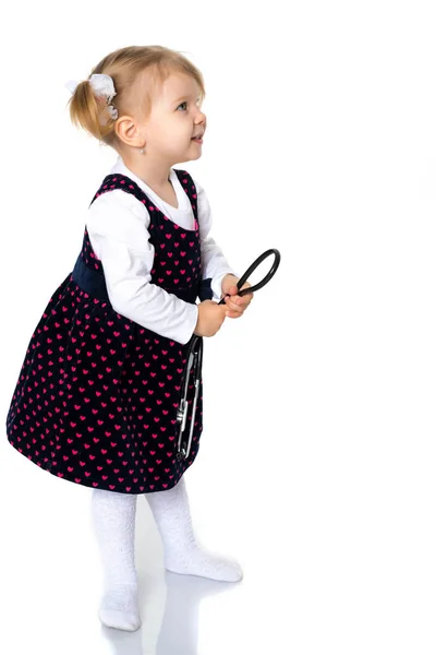 Küçük kız doktor oynuyor — Stok fotoğraf