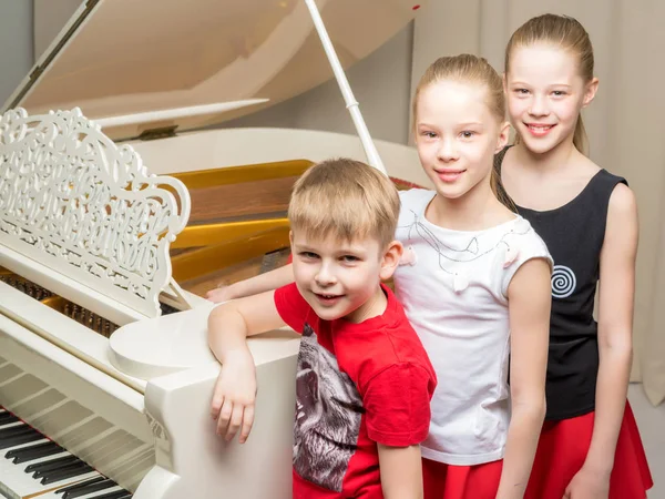 Cheerful Company Children White Grand Piano Concept Music Education Childrens Stock Photo