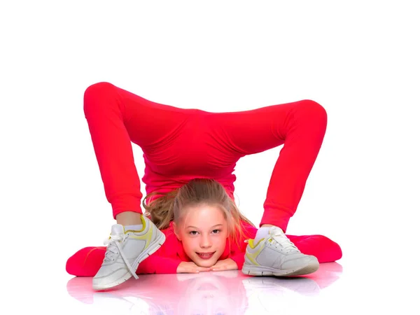 The gymnast perform an acrobatic element on the floor. — Stock Photo, Image