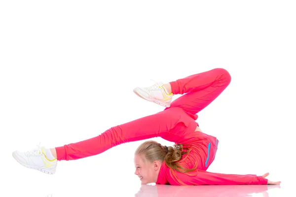 体操選手は床にアクロバティックな要素を実行します。. — ストック写真