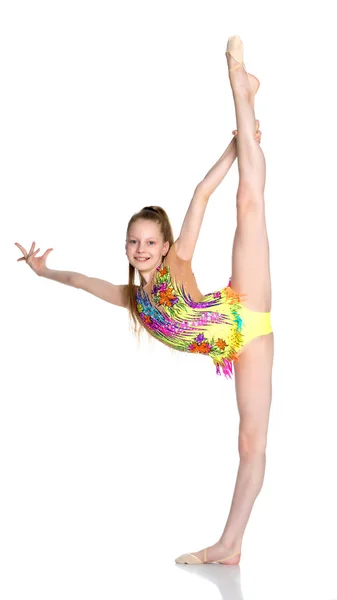 La gimnasta se equilibra en una pierna . —  Fotos de Stock