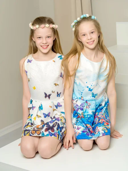 Two beautiful little girls in the studio. — Stock Photo, Image