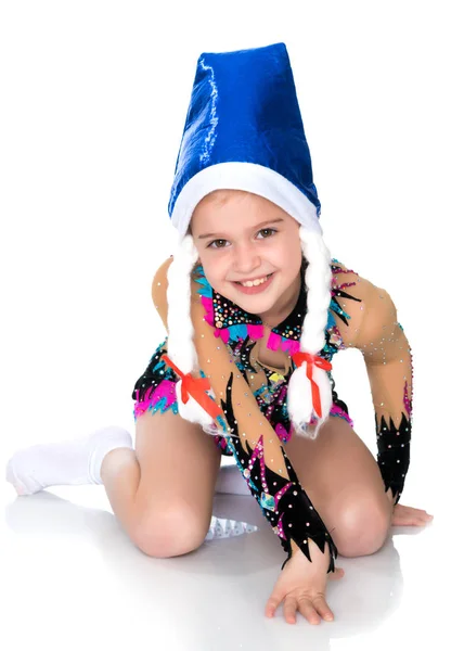 Ginasta menina em chapéu de Papai Noel . — Fotografia de Stock