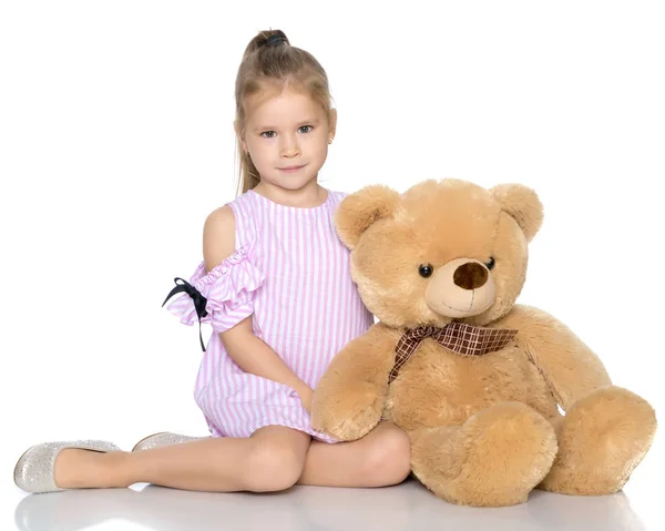 Little girl with teddy bear — Stock Photo, Image