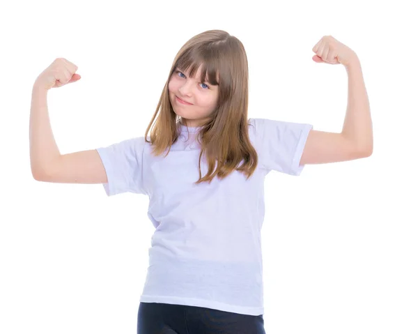 Una niña pequeña muestra sus músculos . — Foto de Stock