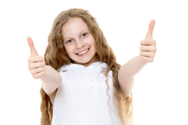 Девочка подросток держит большой палец вверх — стоковое фото