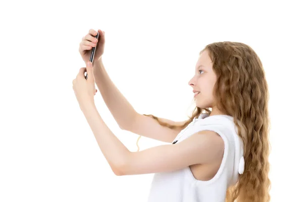 Cute little girl making selfie — Stock Photo, Image