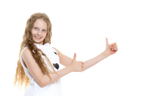 Menina adolescente segura um polegar para cima — Fotografia de Stock