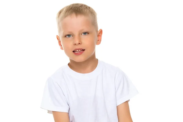 A little boy in a white T-shirt.