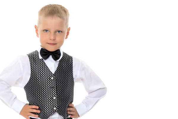 Un niño en un chaleco con una mariposa . — Foto de Stock