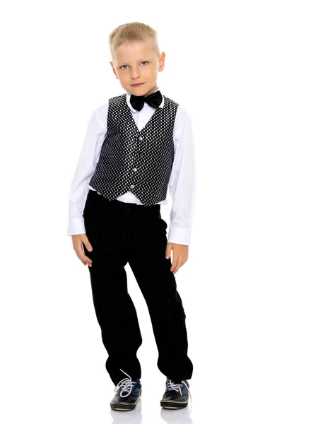 A little boy in a waistcoat with a butterfly. — Stock Photo, Image