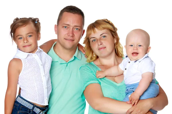 Gelukkige familie met jonge kinderen — Stockfoto
