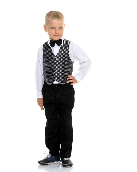 A little boy in a waistcoat with a butterfly. — Stock Photo, Image