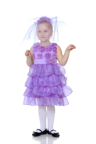 Little girl in purple dress. — Stock Photo, Image