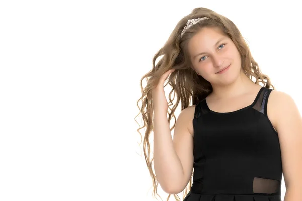 Een school meisje met lang haar. — Stockfoto