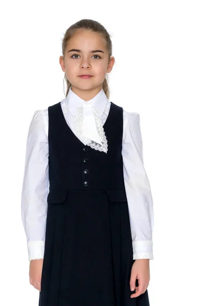 Hermosa niña en uniforme escolar . —  Fotos de Stock