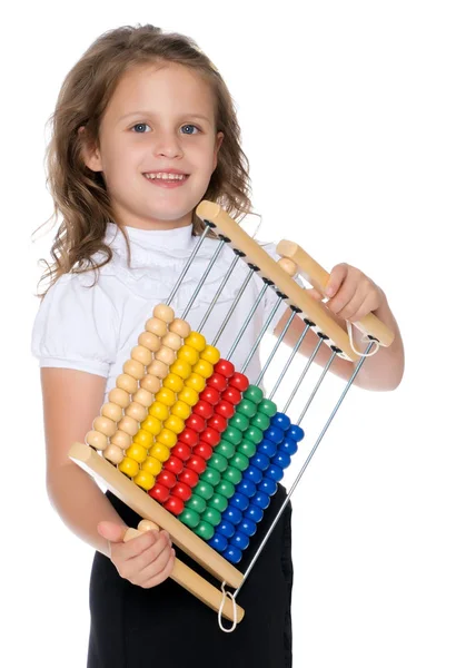 Het meisje rekent op abacus — Stockfoto