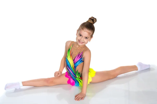 Girl gymnast perform the twine exercise. — Stock Photo, Image