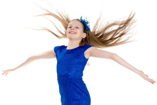 A little girl fixes her hair. — Stock Photo, Image