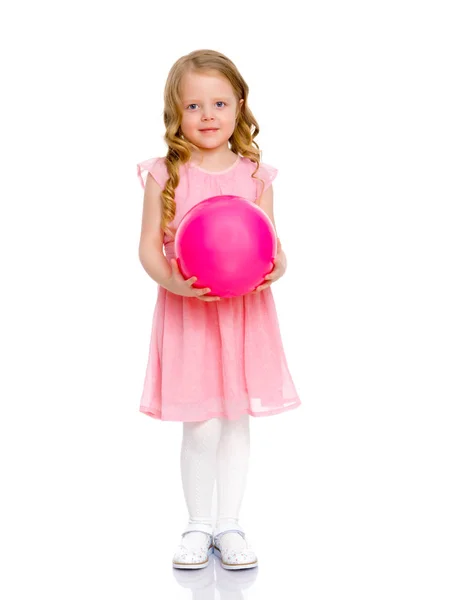Little girl is engaged in fitness with a ball. — Stock Photo, Image