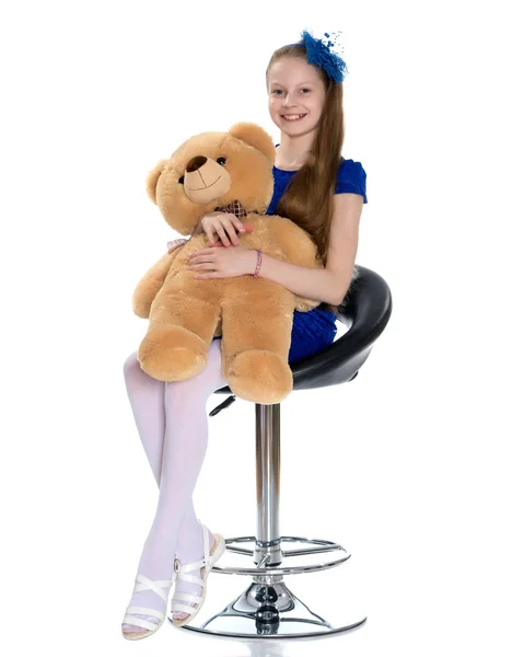 Little girl with a teddy bear. — Stock Photo, Image