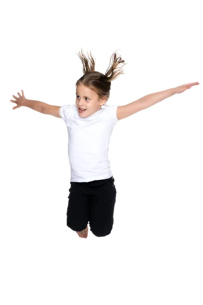 Little girl is jumping. — Stock Photo, Image