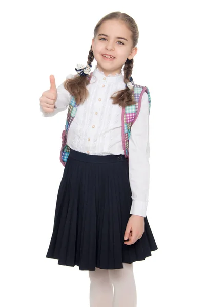 Beautiful schoolgirl with a backpack behind her shoulders. — Stock Photo, Image